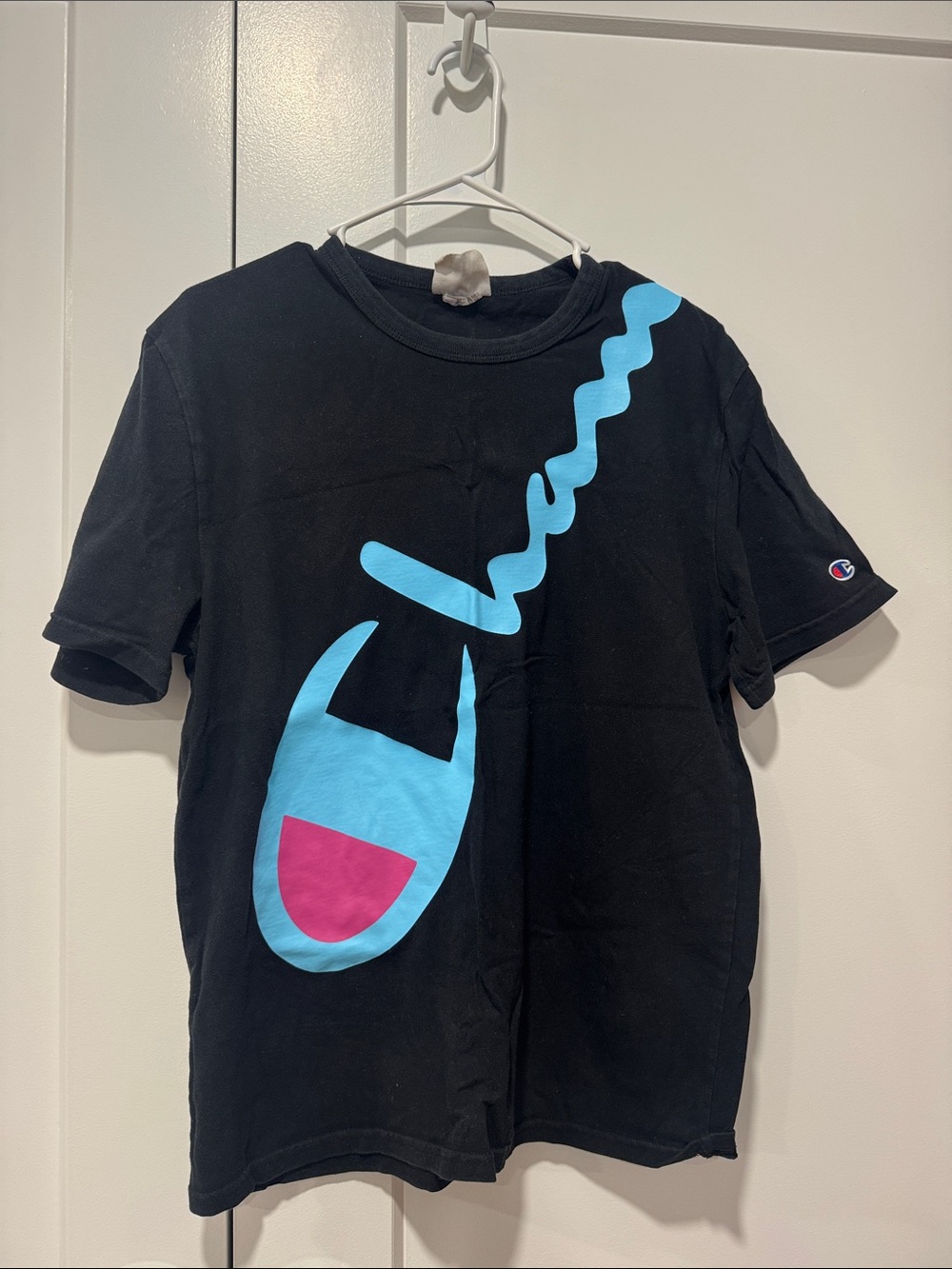 Champion Kids Black Tee with Large Blue & Pink Logo